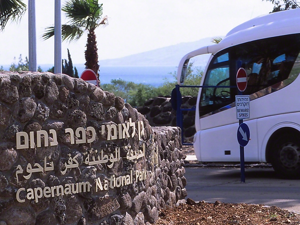 Tour Bus entering Capernum National Park, photographed by Jeff Zablow at Lake Kinneret, Golan Heights, Israel
